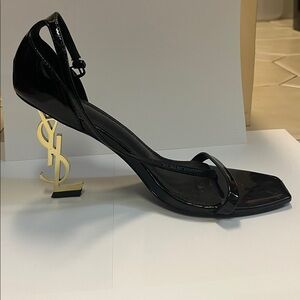 Black Sandal Type Heels. Gold Logo Heels. Ankle strap. size 41.Pre-Owned & worn!